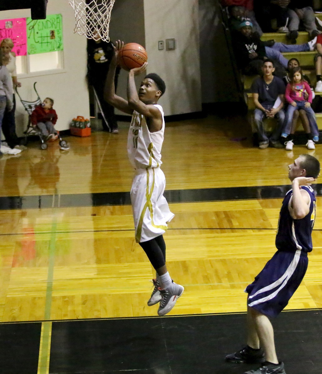 Image: Senior Gladiator, Trevon Robertson(22) is wide open downcourt to score two of his 17-points over Grand Prairie Advantage duing Italy’s Senior Night.