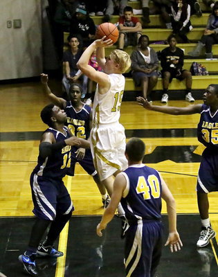 Image: Junior, Cody Boyd(15) puts in 5-points over Grand Prairie Advantage during Italy’s Senior Night.