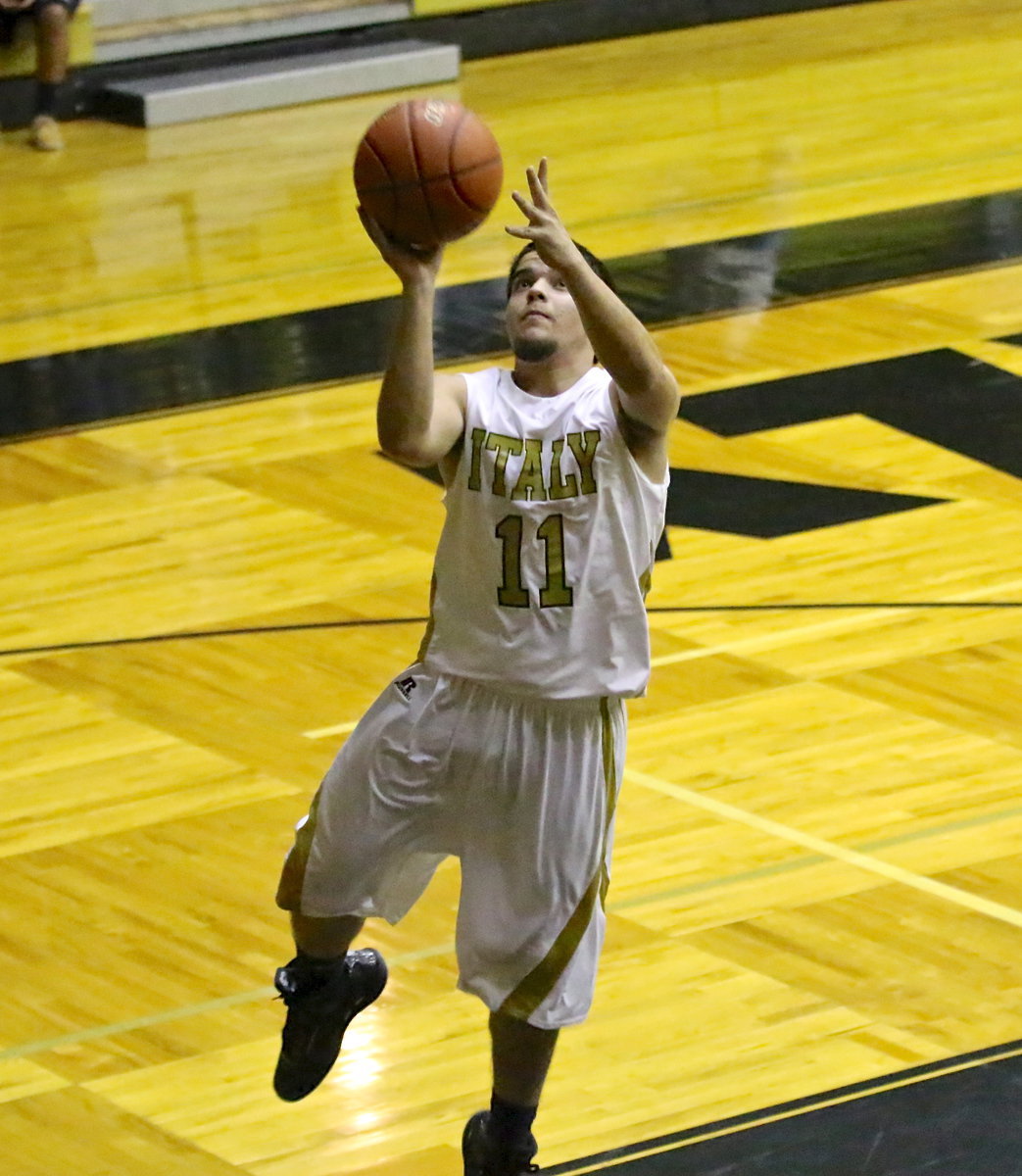 Image: Senior Gladiator, Tyler Anderson(11) steals the ball and then finishes his one man fast break for two of his 4-points. Tyler and his teammates defeated Grand Prairie Advantage, 82-45, during Senior Night inside the Coliseum.