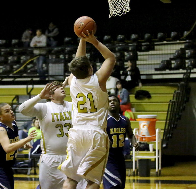 Image: Senior Gladiator, Zain Byers(21) scores inside versus Grand Prairie Advantage. Byers finished Senior Night with a total of 7-points.