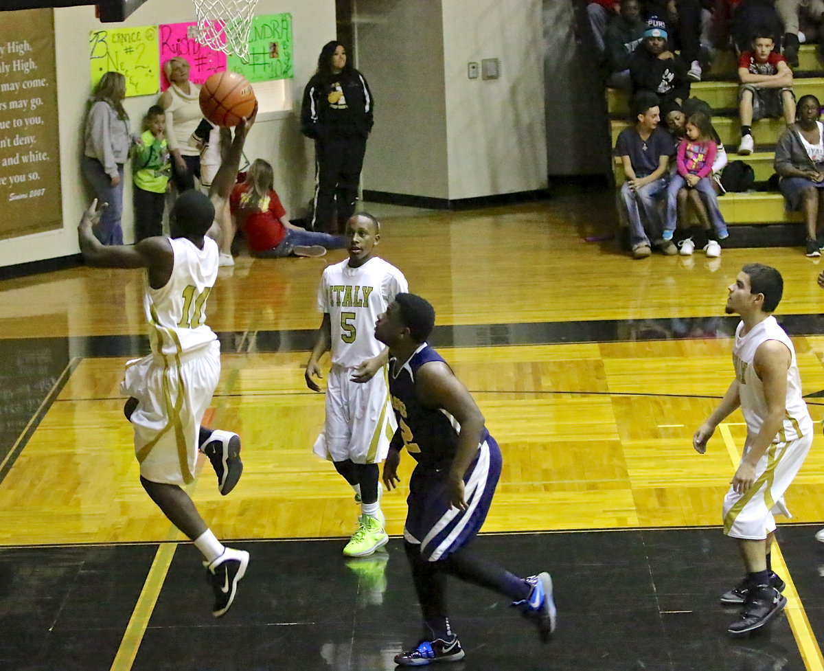 Image: Executing a 3-on-1 fast break opportunity to perfection is Kevin Johnson(5), Tyler Anderson(11) and TaMarcus Sheppard(10). Anderson dished to Sheppard for the sure basket.