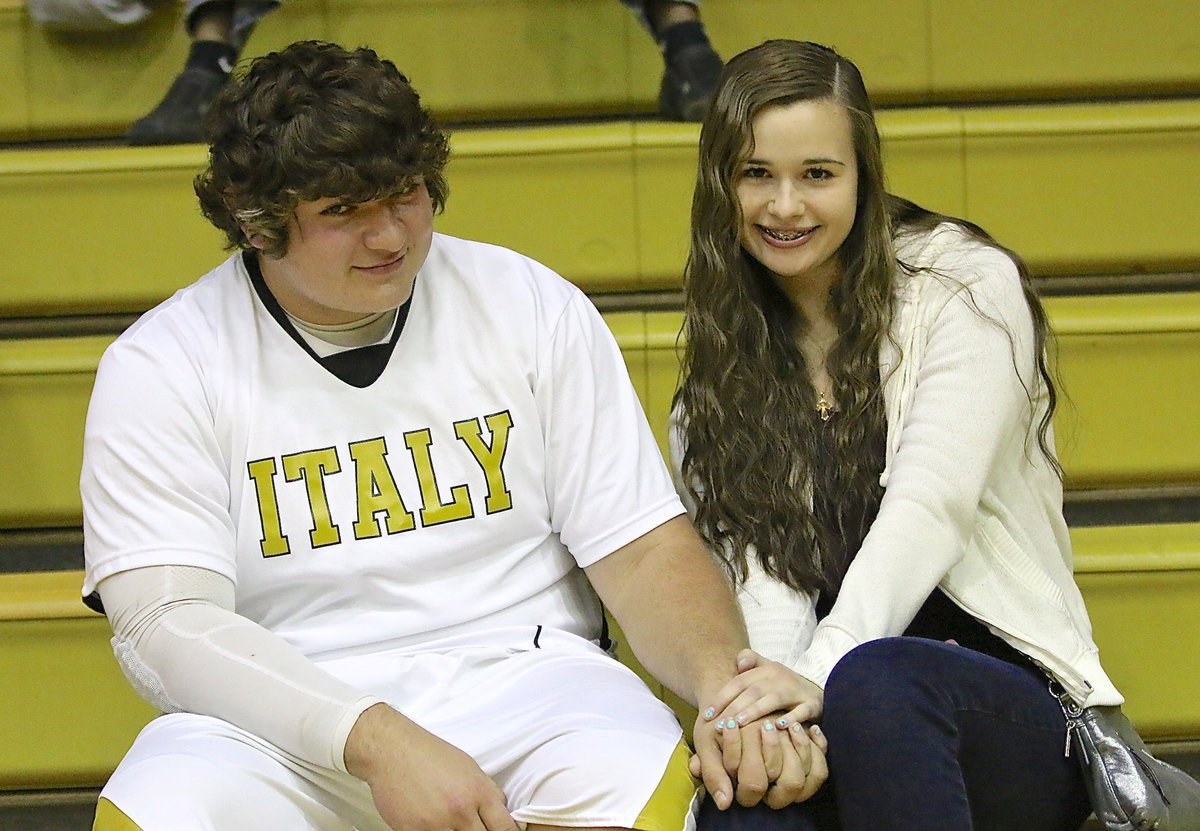 Image: It’s good to be a Gladiator! Kevin Roldan(33) had plenty of support on Senior Night from, Amber Hooker, with his final home game as a Gladiator just moments away from tip-off.