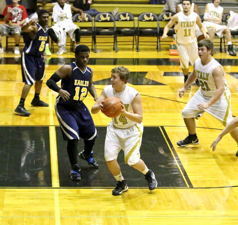 Image: Bailey Walton(14) turns and pops over an Eagle defender.