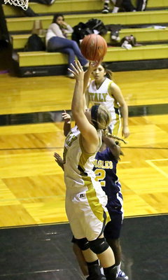 Image: Jaclynn Lewis(13) scores two of her 4-points for the Lady Gladiators.