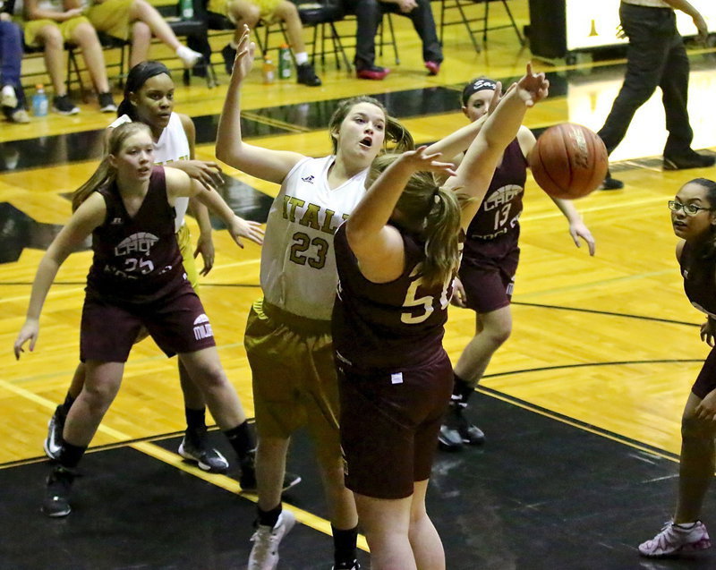 Image: Italy’s, Grace Haight(23) fights for an offensive rebound.