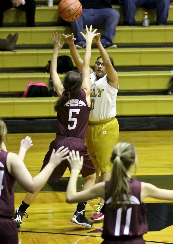 Image: Italy 7th Grader, Karla Perez(30) tries a jumper from 3-point land.