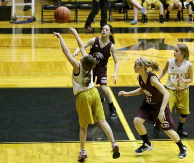 Image: Caitlin Oldfield(5) fakes out a Mildred defender and then puts up a shot for the Italy’s 7th grade girls.