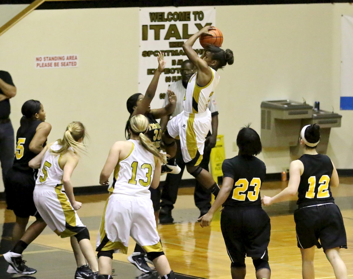 Image: Lady Gladiator Kortnei Johnson(3) has the quicks to get to the basket.