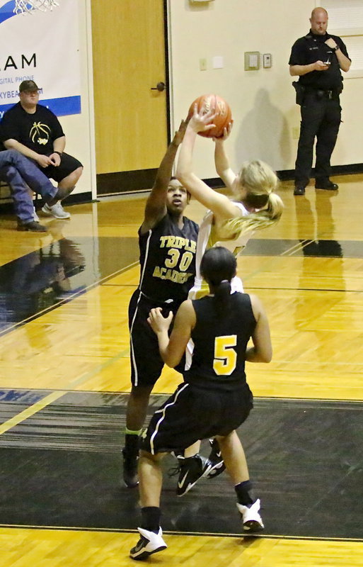 Image: Halee Turner(5) finishes the fast break with a 2-pointer.