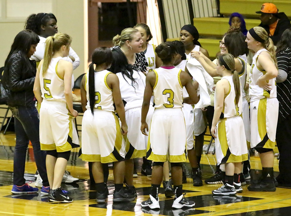 Image: Lady Gladiator head coach Melissa Fullmer keeps her players grounded during the high intensity game.