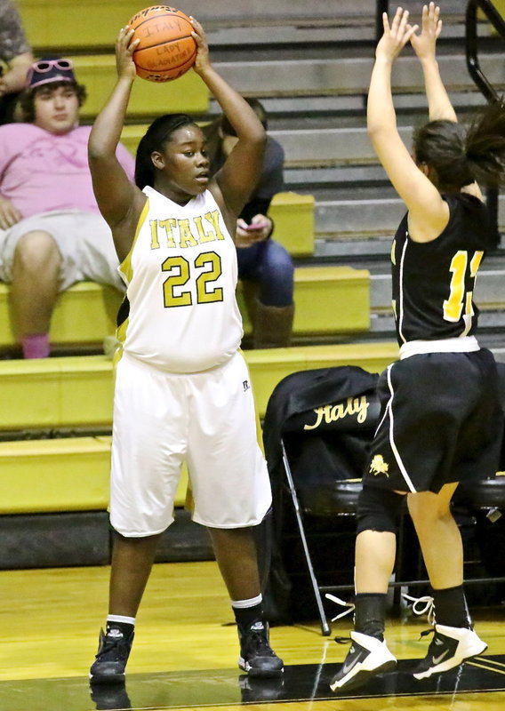Image: Taleyia Wison(22) prepares to inbound the ball for the Lady Gladiators.