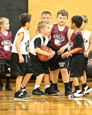 Image: An aggressive Levi Joffre(5) secures a defensive rebound in traffic for the IYAA’s 1st/2nd grade boys team.