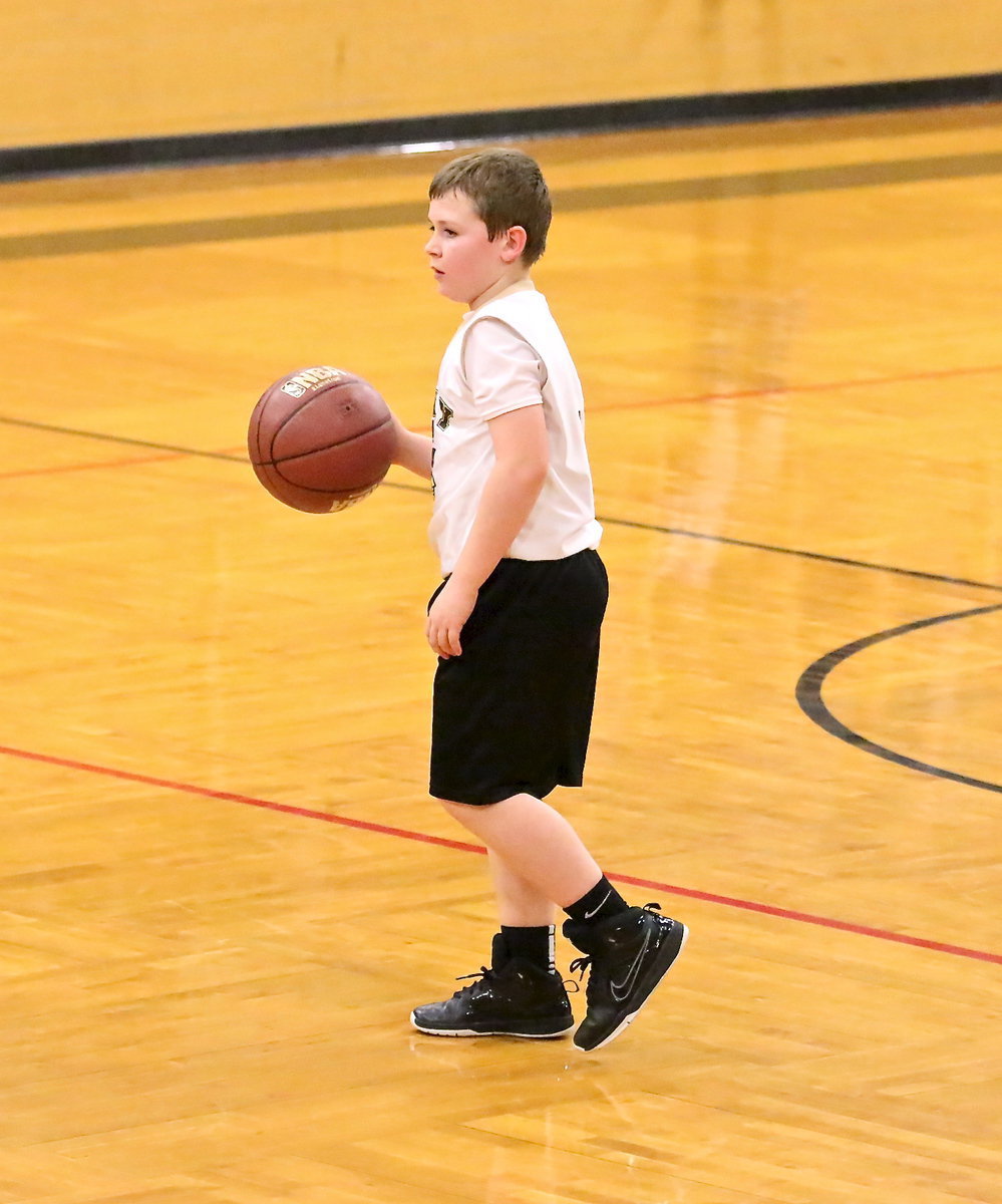 Image: IYAA’s Bryce DeBorde(3) handles the ball like a pro while setting up the offense.