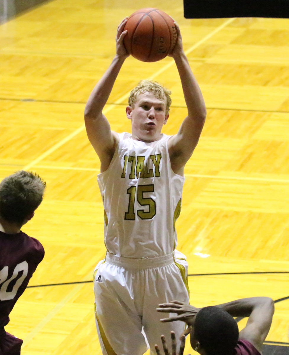 Image: Gladiator Cody Boyd(15) out rebound the SkyHawks from Summit.