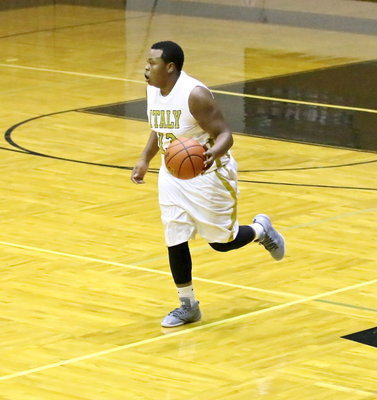 Image: Darol Mayberry(13) brings the ball up the floor.