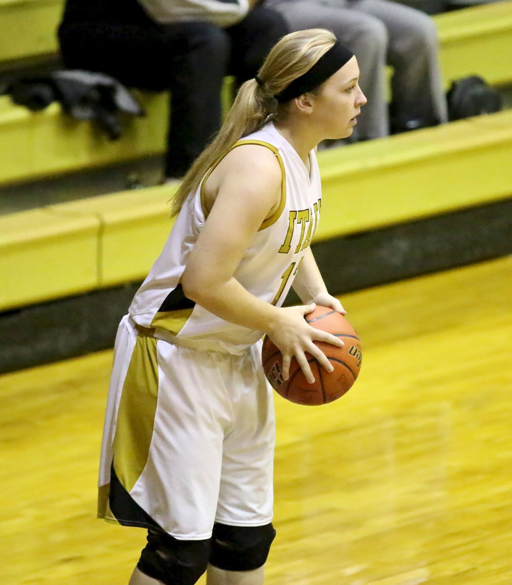 Image: Jaclynn Lewis(13) inbounds the ball.