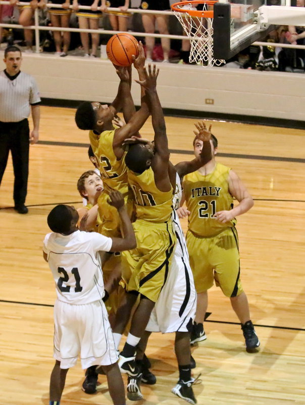 Image: Gladiator Trevon Robertson(22) out boards everybody to put back the shot.