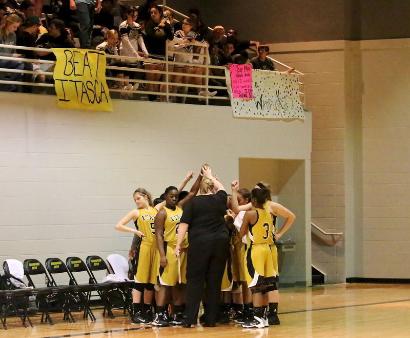 Image: Head coach Melissa Fullmer and her Lady Gladiators get ready for the intense matchup against Itasca with Gladiator Nation showing up in full force.