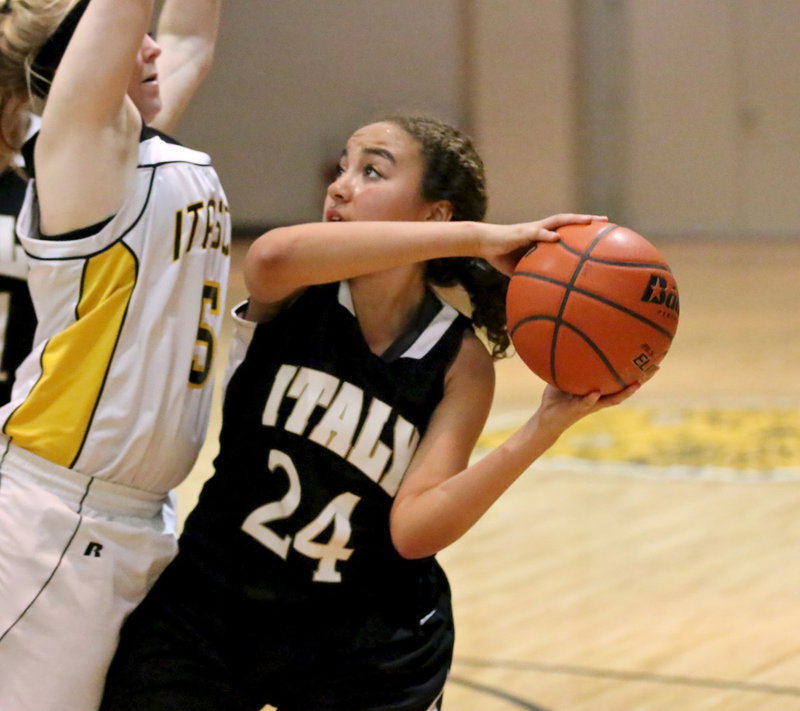 Image: JV Lady Gladiator Vanessa Cantu(24) tries to score near the basket while Itasca tries to make a stand.