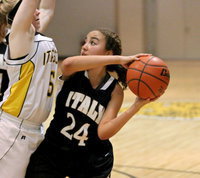 Image: JV Lady Gladiator Vanessa Cantu(24) tries to score near the basket while Itasca tries to make a stand.