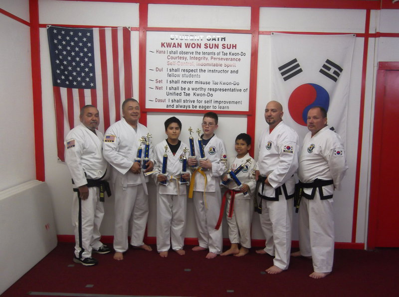 Image: Pictured here: Master Charles Kight-Chief Instructor of the school,  Javier Gonzalez, Michael Gonzalez, Michael Russell, and Nick Sam all of Italy and Danny Smith-Sparring Instructor and David Jones-Instructor.