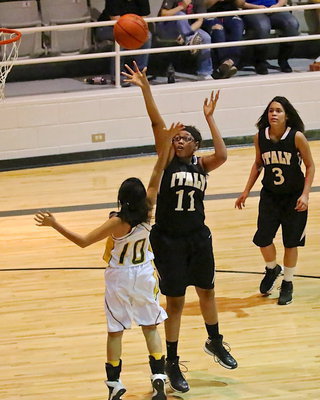 Image: Oleshia Anderson(11) is hard to stop near the rim.