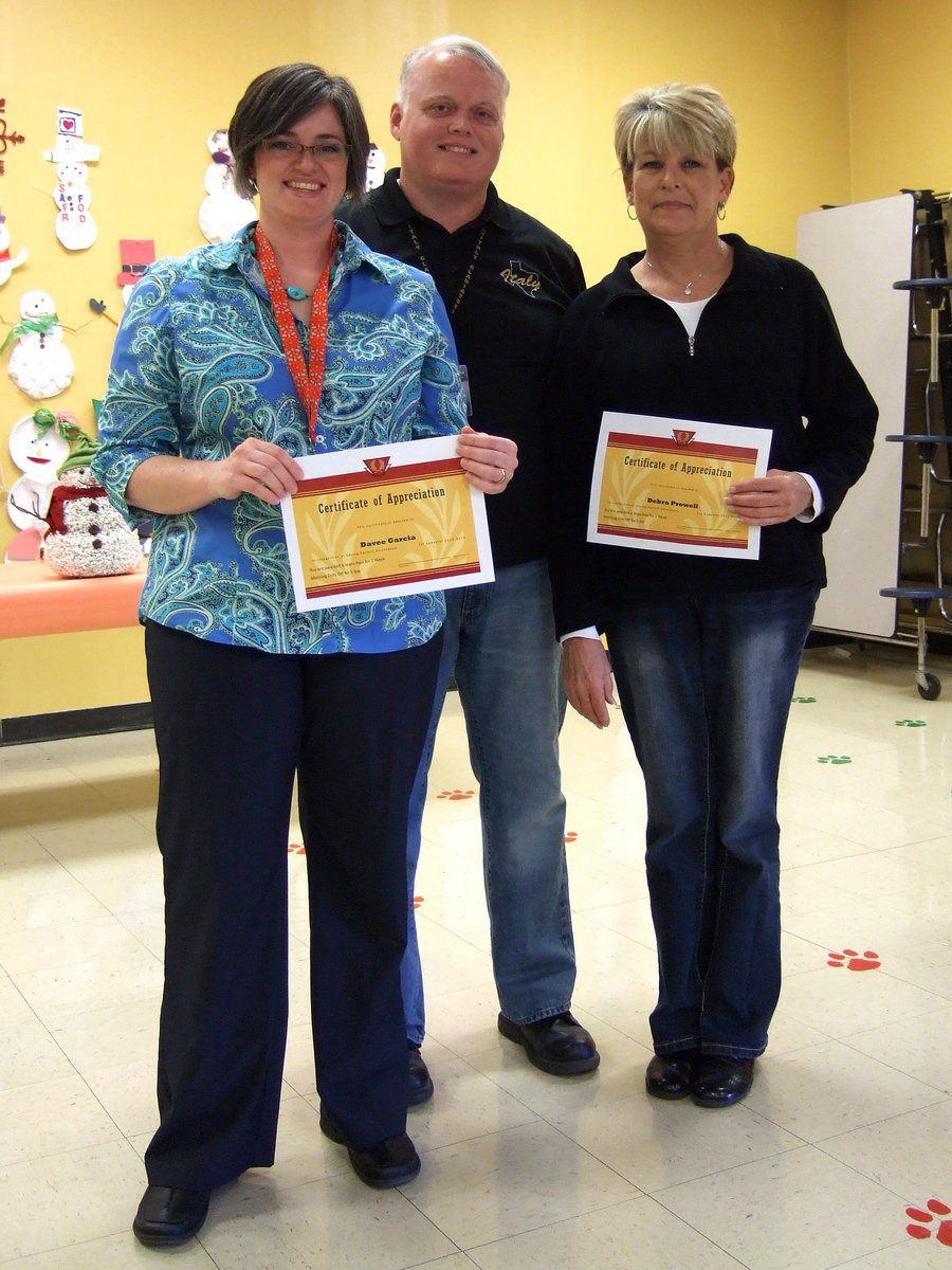 Image: Davee Garcia(4th grade teacher), Jonathan Nash (principal) and Debra Prowell (6th grade teacher). Davee and Debra received perfect attendance awards.