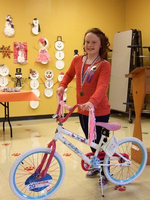 Image: Sadie Hinz (4th grade) won a bike for perfect attendance.