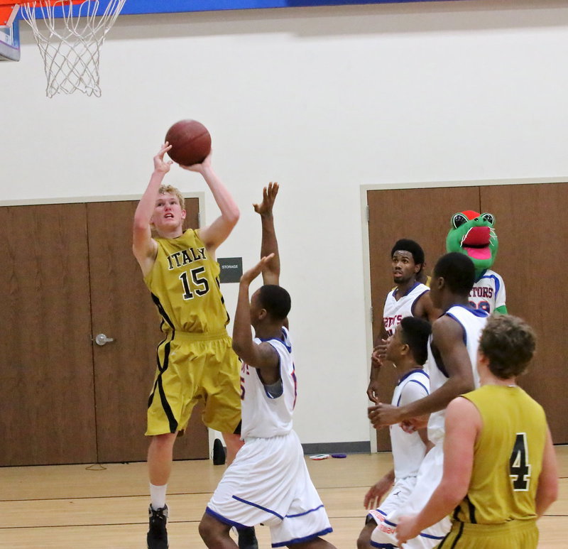 Image: Italy’s Cody Boyd(15) gets a look from the low block area.