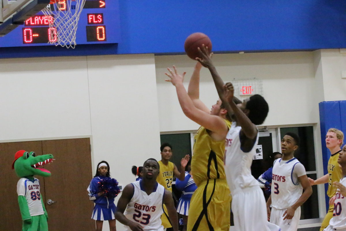 Image: Zain Byers(21) scores near the bucket for Italy.