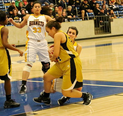 Image: Lady Gladiator Vanessa Cantu(24) ties up the wall.