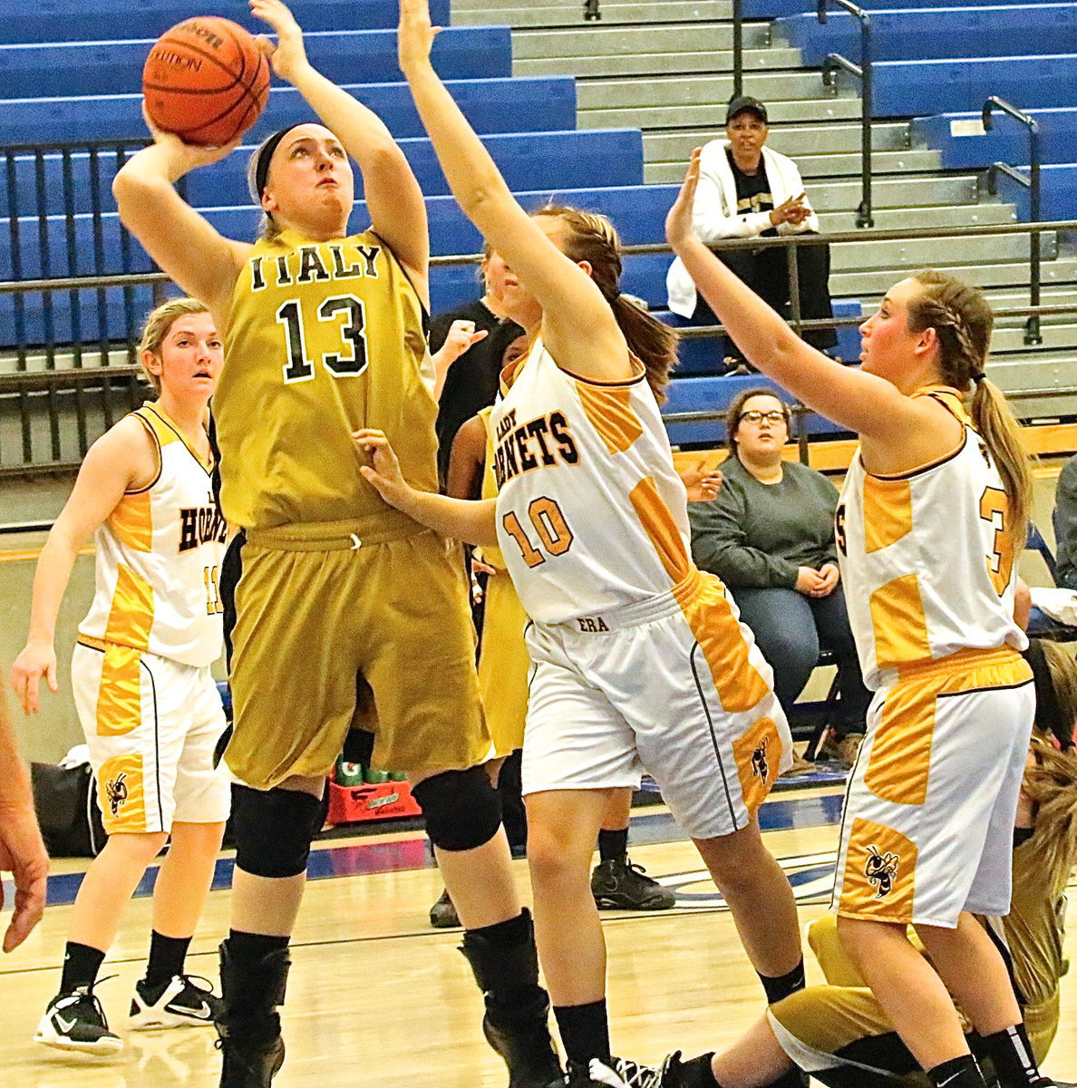 Image: Lady Gladiator Jaclynn Lewis(13) makes an aggressive move toward the goal and draws a shooting foul.