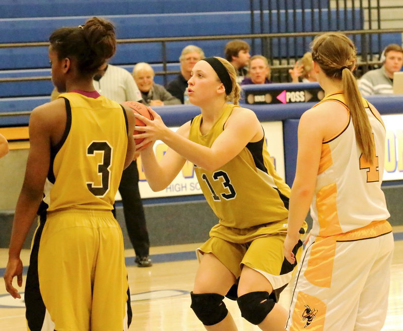 Image: Jaclynn Lewis(13) makes both free-throws and puts in 3-out of-4 from the charity stripe for the game.