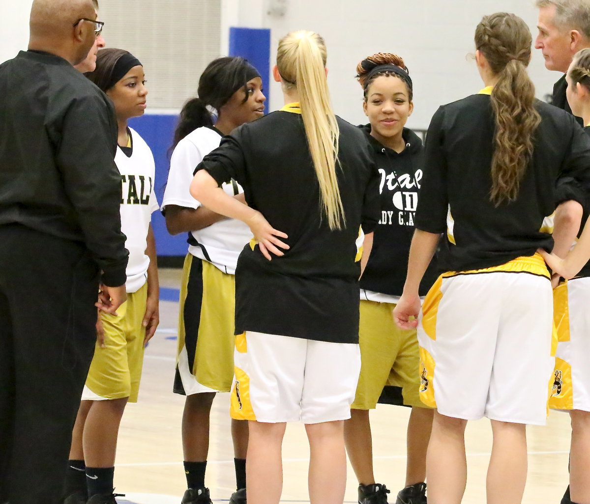 Image: Lady Gladiator senior captains Bernice Hailey, Kendra Copeland and Ryisha Copeland get ready to lead their teammates against the Era Lady Hornets in a bi-district matchup in Saginaw on Wednesday.