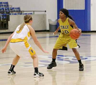 Image: Senior point guard Kendra Copeland(10) tries to jump start Italy’s half-court offense.