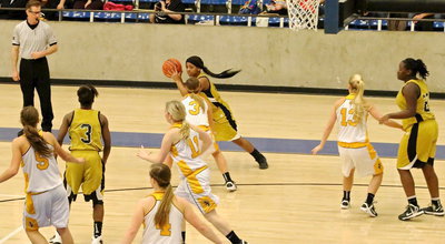 Image: Lady Gladiator senior Bernice Hailey(2) looks to pass from the wing.