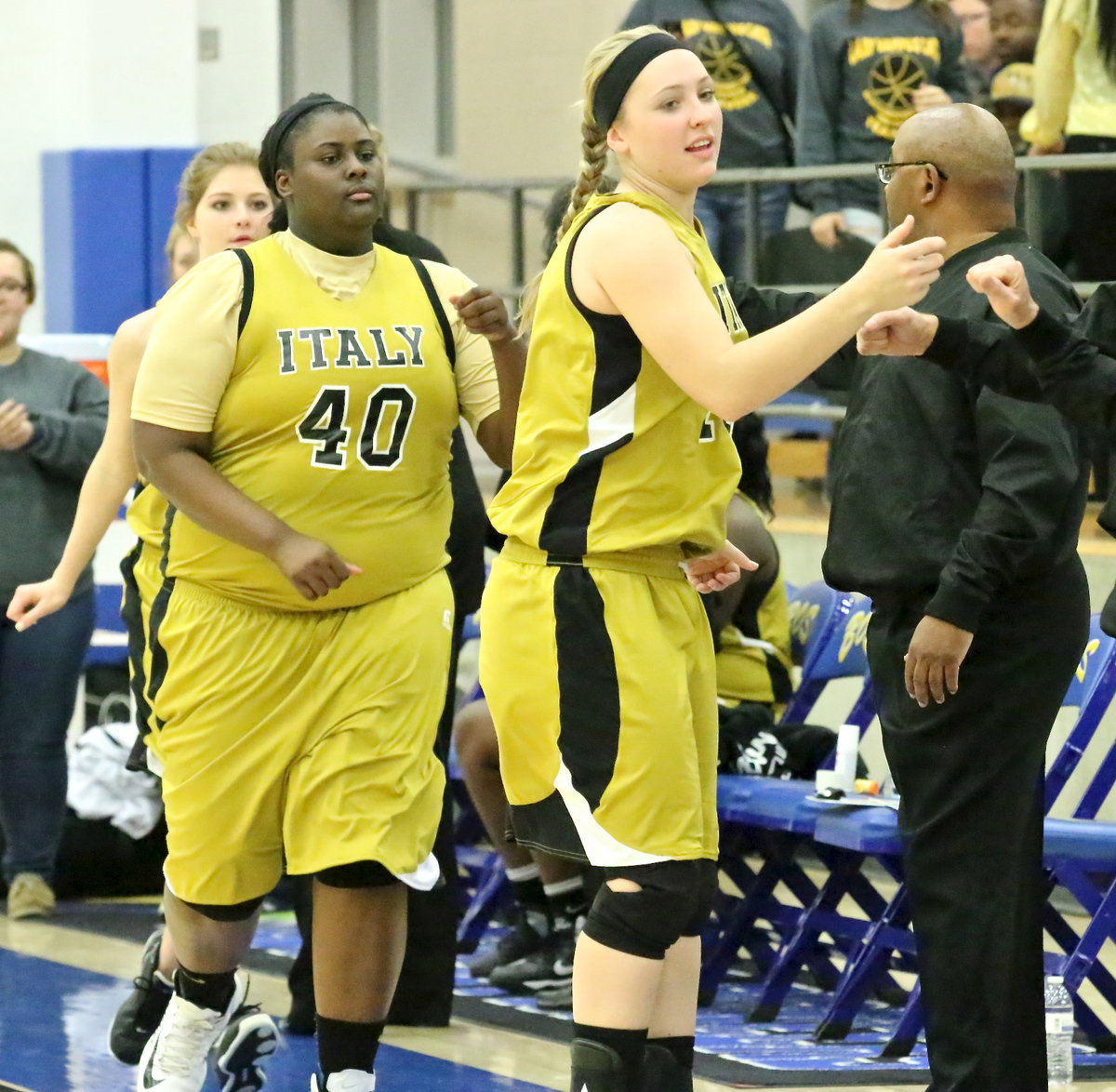 Image: Lady Gladiators Jaclynn Lewis(13), Cory Chance(40) and Halee Turner(5) are introduced before tip-off against Era.