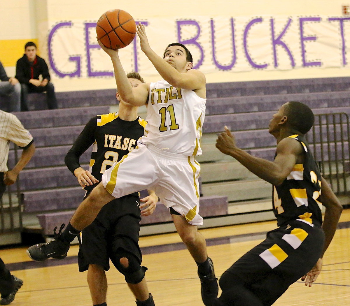 Image: Tyler Anderson(11) gets to the hoop for Italy.