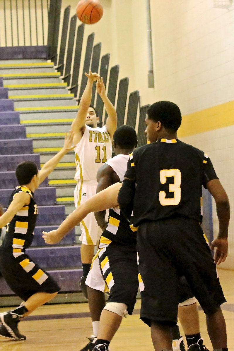 Image: Gladiator Tyler Anderson(11) shoots from the corner against Itasca with a chance for Italy to become the district runner-up and playoff seeding on the line.