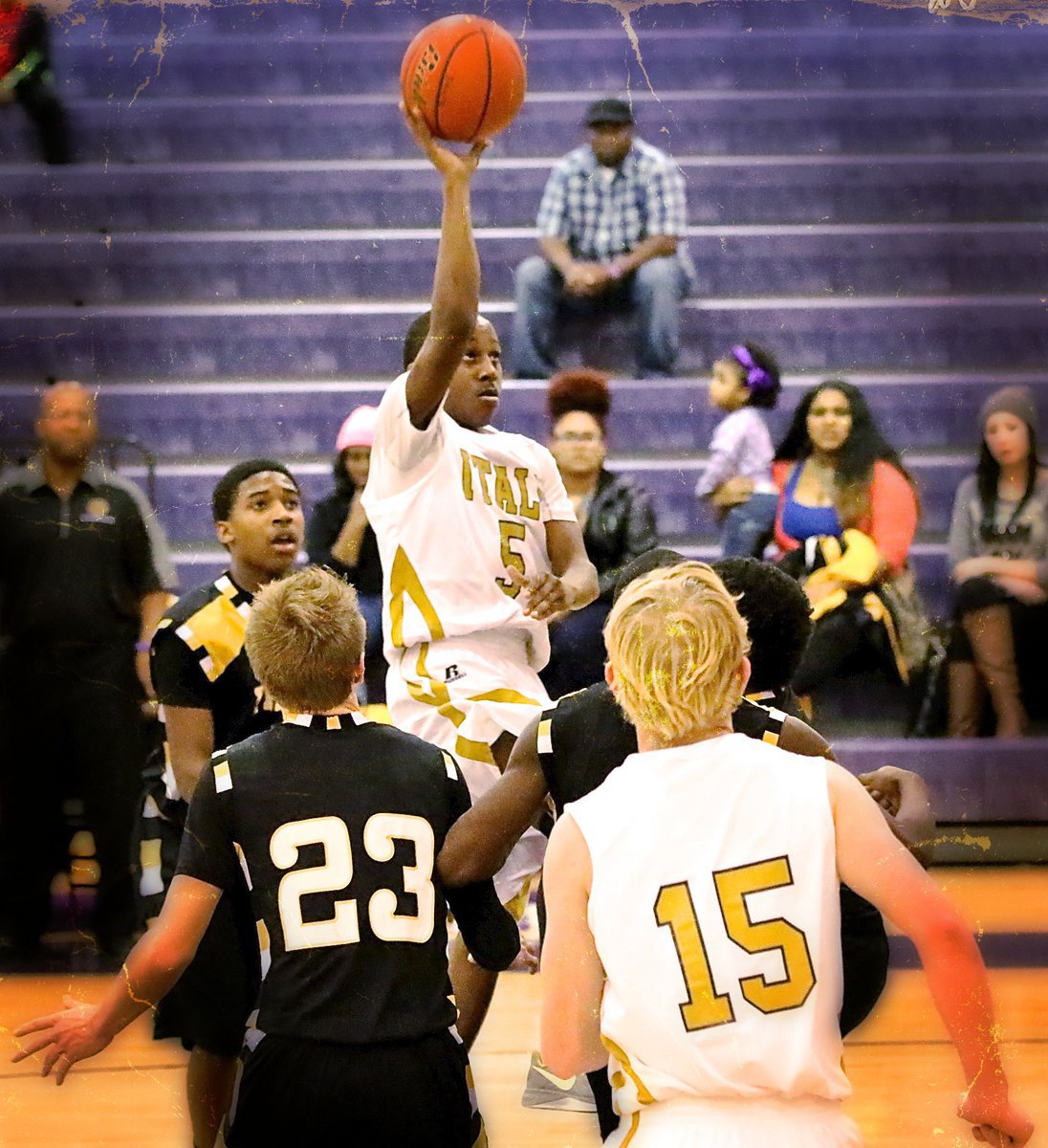 Image: The freshman, Kevin Johnson(5) scores with a running one-hander over the Wampus Cats.