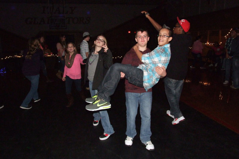 Image: Cason Roberts slow dances with Matthew Monreal as Karson Holley, Karley Nelson and Adam Powell keep to the beat.