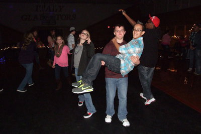 Image: Cason Roberts slow dances with Matthew Monreal as Karson Holley, Karley Nelson and Adam Powell keep to the beat.