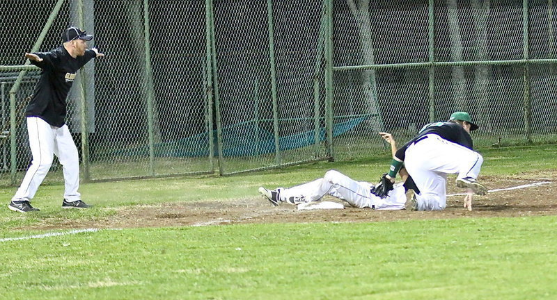 Image: That’s Jorge Galvan(10) sliding safely into third base, just ask Coach Cady.