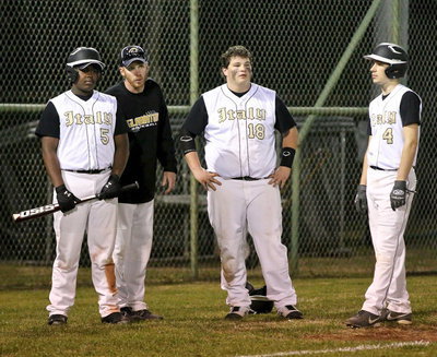 Image: Coach Cady(11) coaches up Kenneth Norwood, Jr.(5), John Byers(18) and Ryan Connor(4) during the injury timeout.