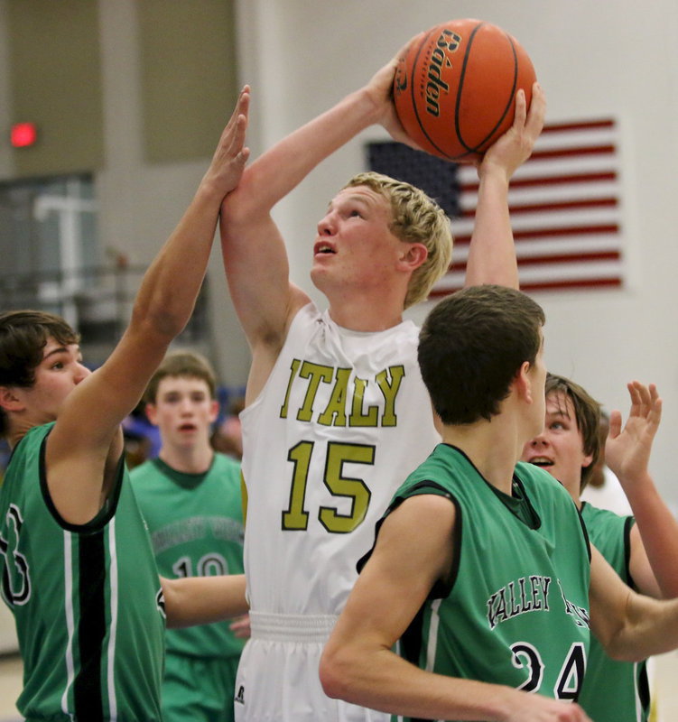 Image: Gladiator Cody Boyd(15) scores a basket in the third period.