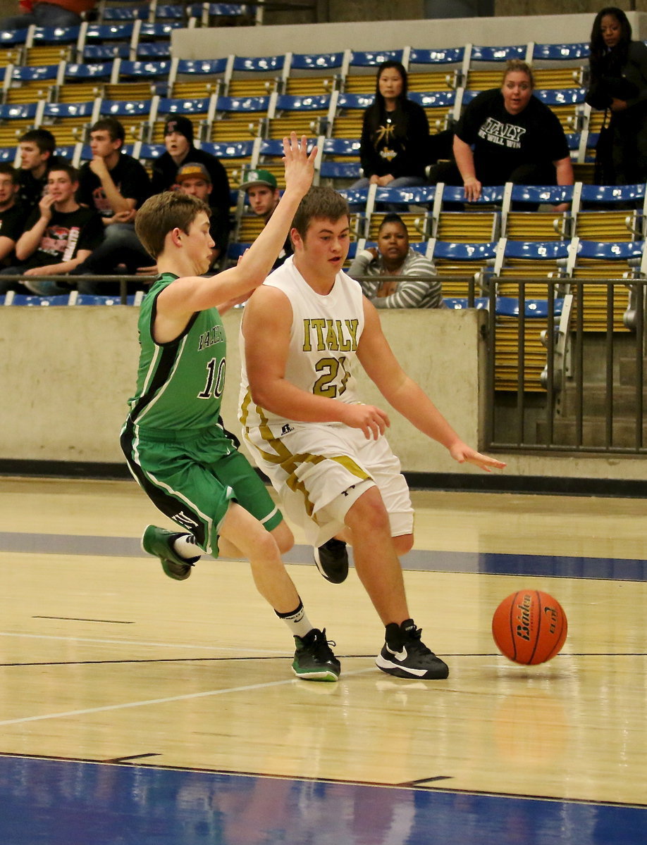 Image: Gladiator Zain Byers(21) steals a pass and then drives the length of the court to put up a shot.