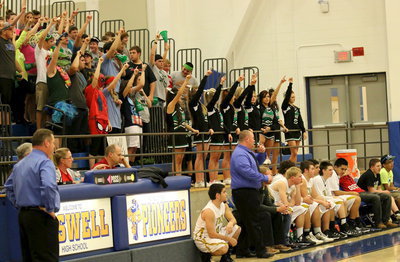 Image: Head coach Brandon Gansky (blue shirt…on the right) and the Italy bench endured the wrath of Valley View’s student body to get the win.