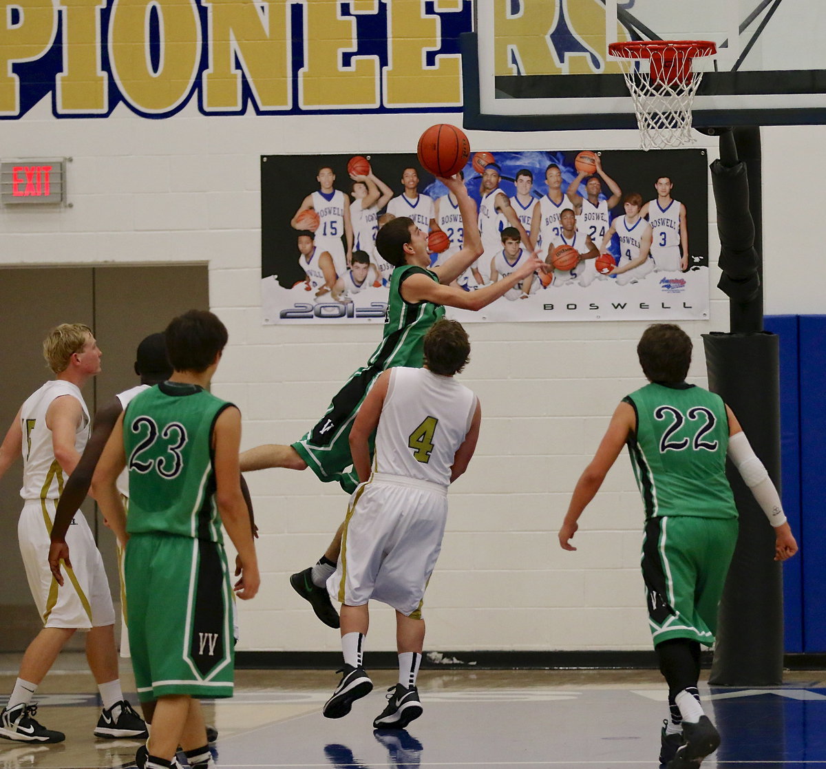 Image: Gladiator Bailey Walton(4) does just enough to cause a Valley View shot attempt to hit off the mark.