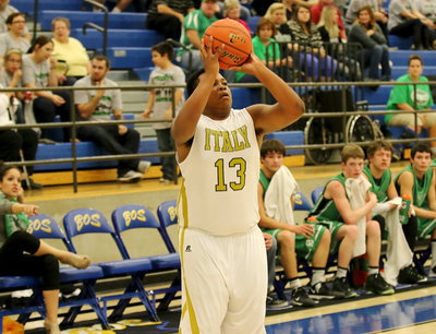 Image: Gladiator Darol Mayberry(13) attempts a 3-pointer.
