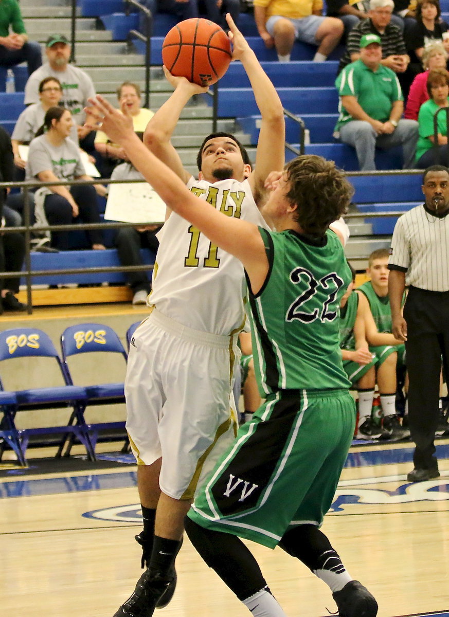 Image: Tyler Anderson(11) puts up a shot for the Gladiators.